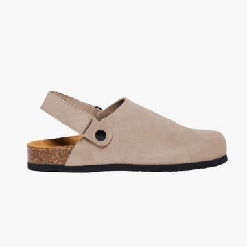 Taupe Gray suede clog with cork sole and adjustable back velcro strap, displayed on a white background.